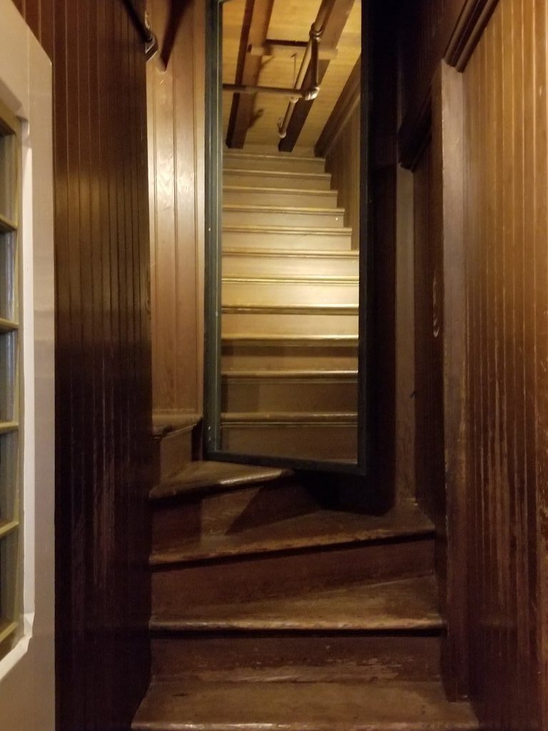 mirror in the midle of stairs.