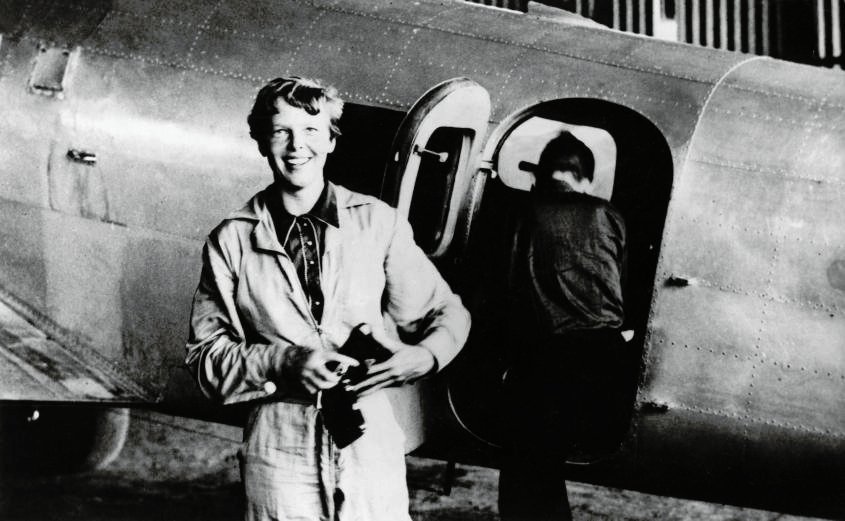 Earhart getting ready for one of her flights.