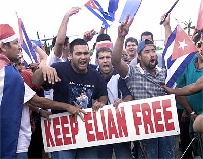 Cuban-American protesters demonstrate in the streets of Miami's Little Havana,