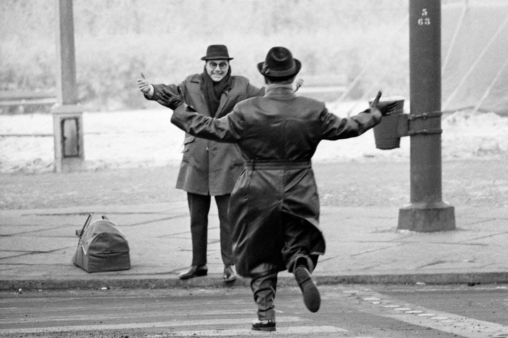Two Brothers reuniting after West Berliners were allowed to cross the East Berlin.