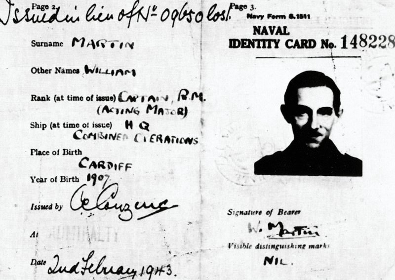 Naval identity card of Major Martin with photograph of Captain Ronnie Reed
