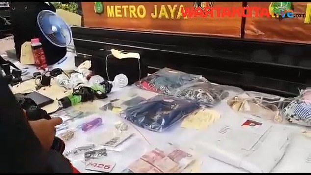 evidence displayed on a table during the press conference