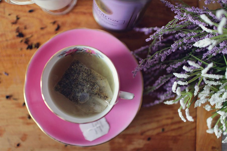 handcrafting of flowering tea bundles - processing of flower tea